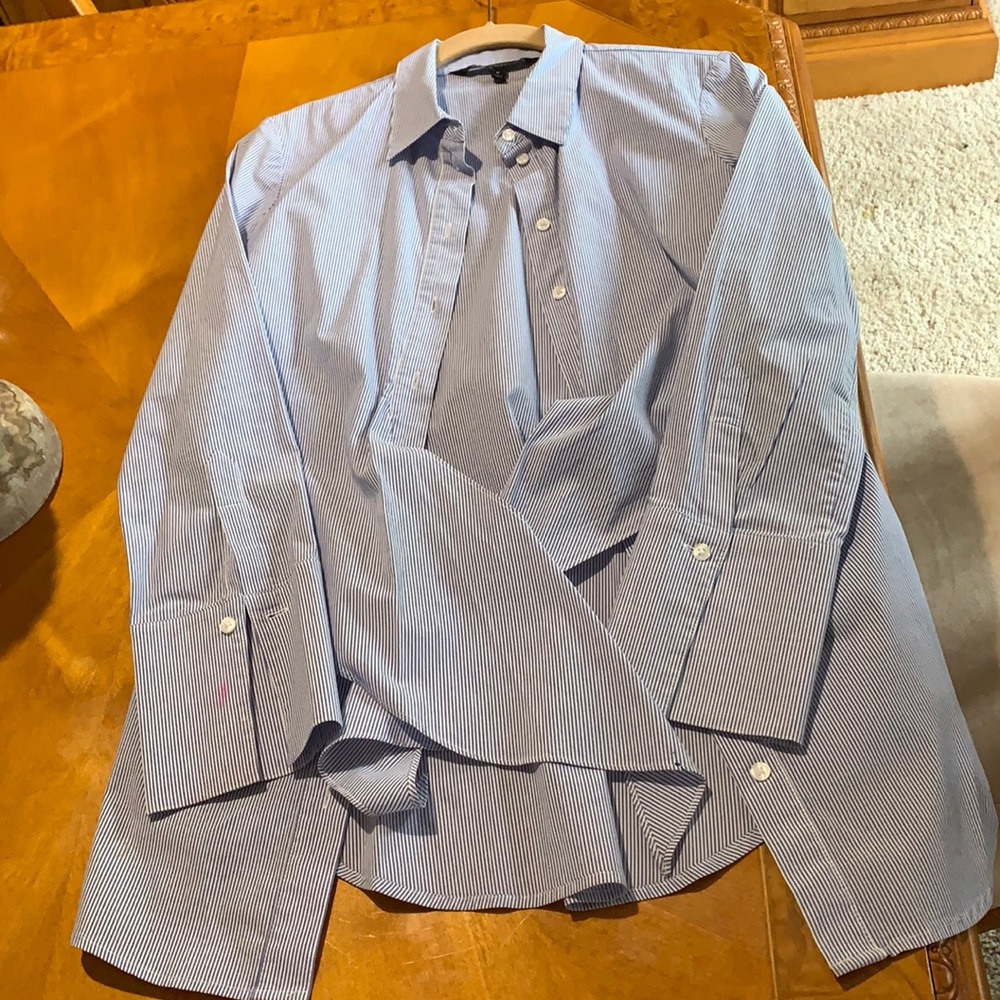 A long striped long shirt with a tie.
